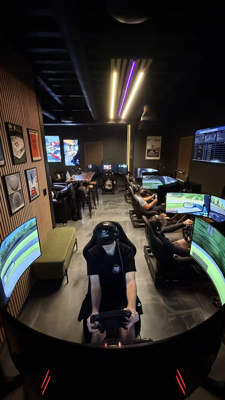 A full house of guests racing simulators at The Race Haus