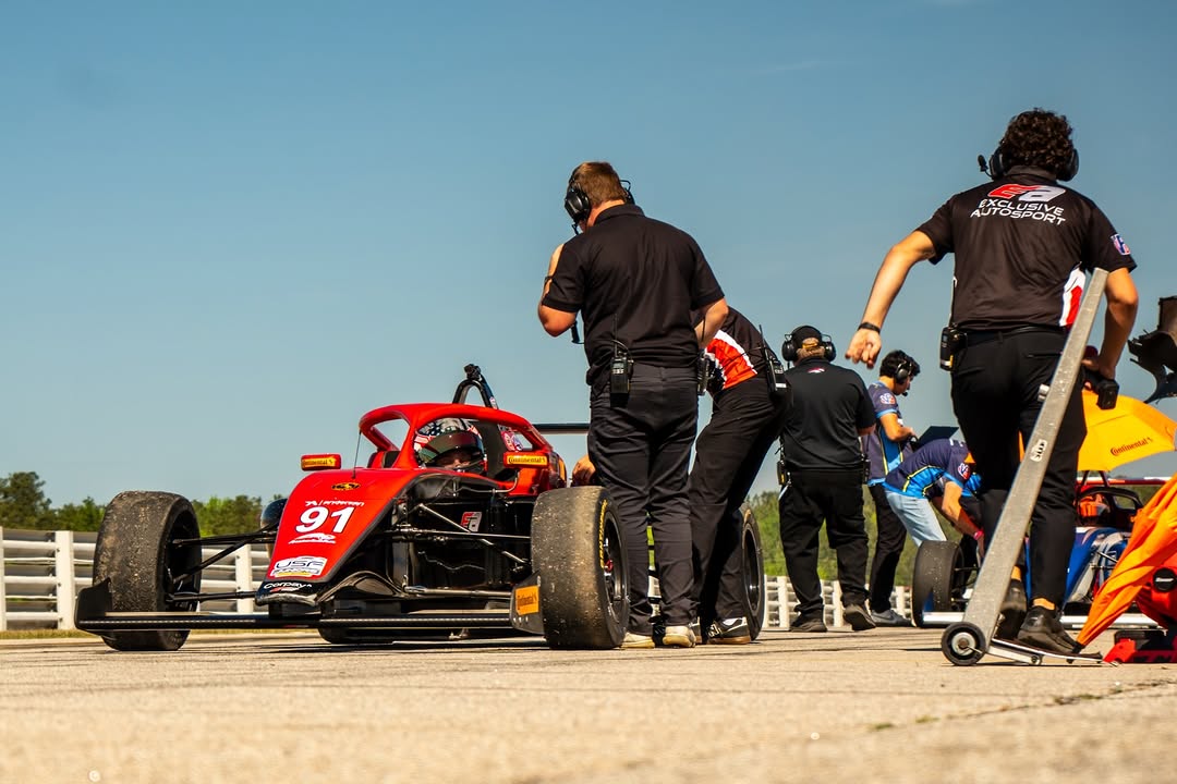 Open-wheel race car in motion
